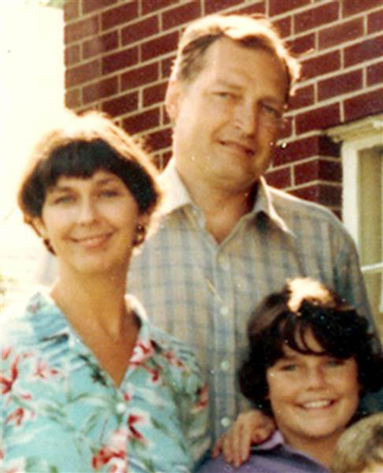 Savannah Guthrie is pictured next to her mother, Nancy, and father, Charles, in this vintage family photo. (TODAY)