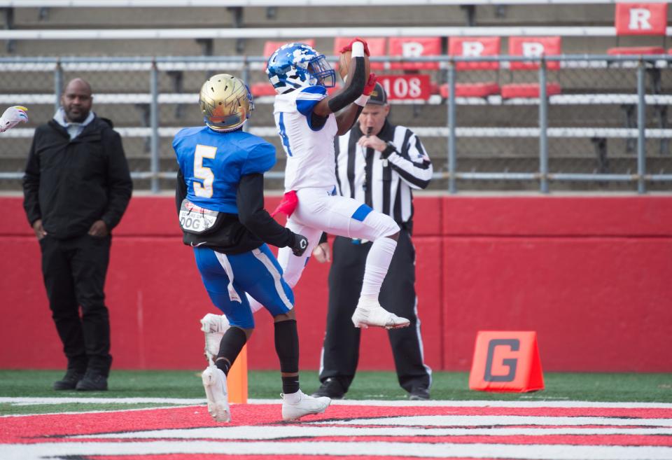 Salem's Ramaji Bundy leaps into the end zone for a touchdown during the 3rd quarter of the South-Central Group 1 regional championship football game between Salem and Woodbury played at Rutgers University in Piscataway on Sunday, December 5, 2021.  Salem defeated Woodbury, 34-8.