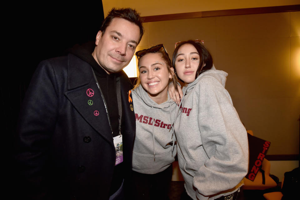 <p>Jimmy Fallon, Miley Cyrus, and Noah Cyrus at the Washington, D.C. March for Our Lives event, where Miley performed. (Photo: Getty Images) </p>