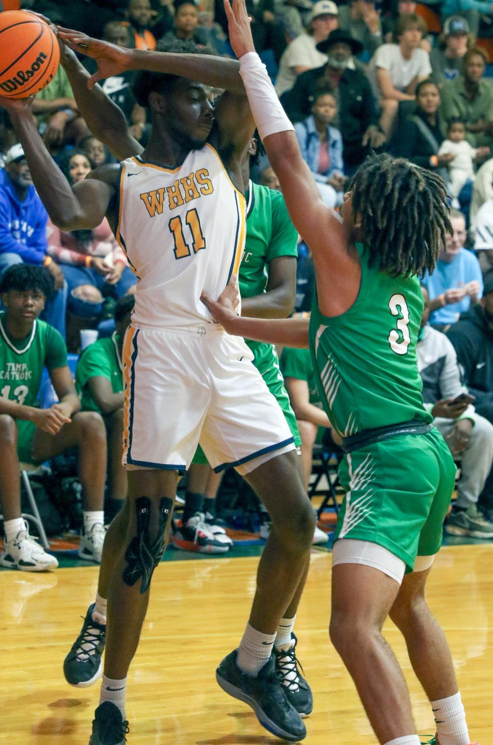 Winter Haven's Dylan James looks to pass against Tampa Catholic on Saturday at the Mosaic 2023 Stinger Shootout at Bartow High School.