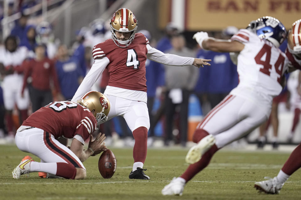 San Francisco 49ers place kicker Jake Moody (4) kicks a field goal from the hold of Mitch Wishnowsky during the second half of an NFL football game against the New York Giants in Santa Clara, Calif., Thursday, Sept. 21, 2023. (AP Photo/Godofredo A. Vásquez)