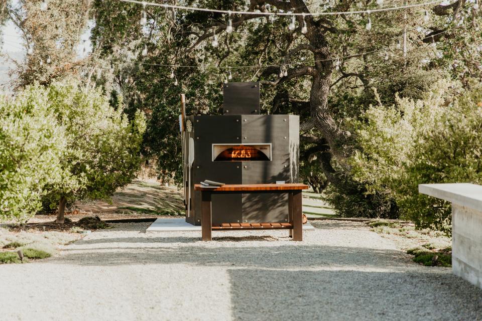 A pizza oven is a great visual element for an outdoor space—with delicious results.