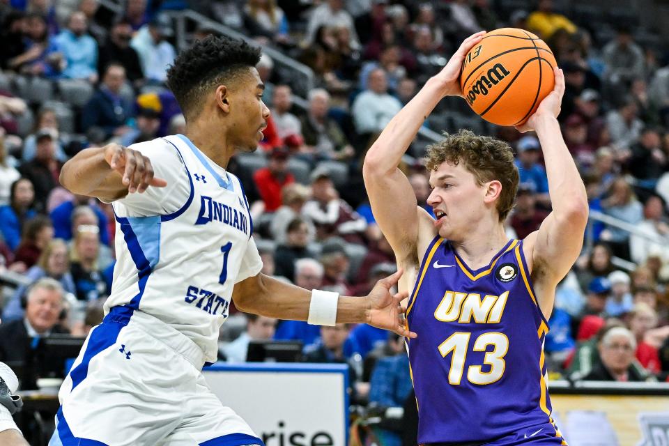 Northern Iowa Panthers guard Bowen Born (13) controls the ball in a game against Indiana State on March 9. On Tuesday, Born announced his intention to transfer from UNI.