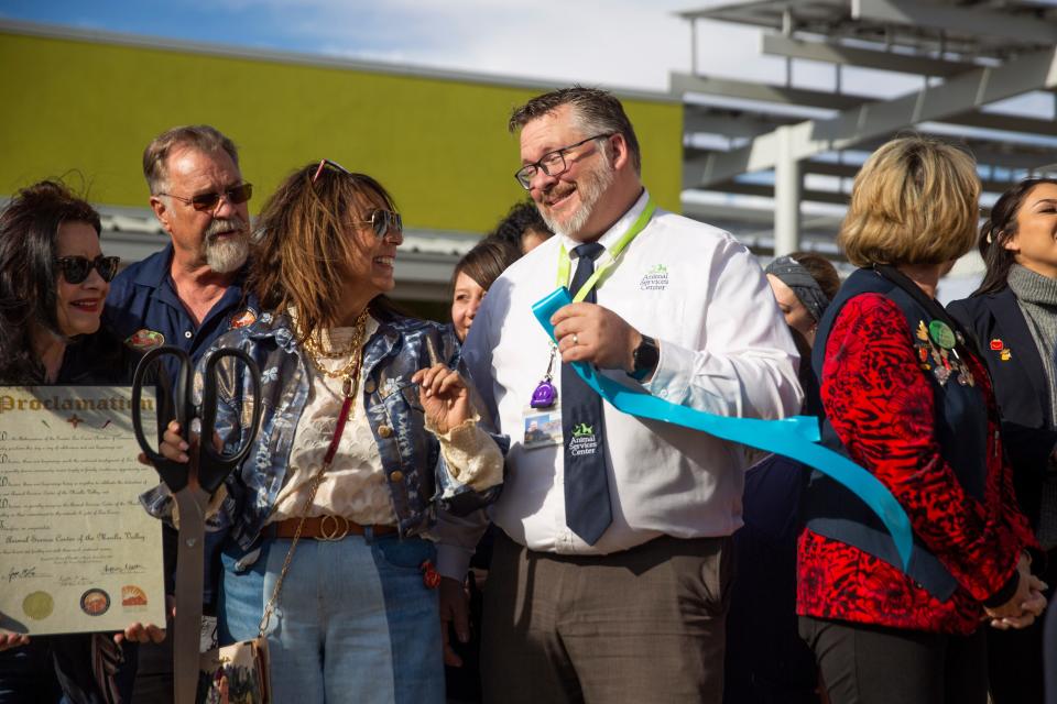Mayor Pro Tim Kasandra Gandara and Director Clint Thacker smile at one another during the Animal Services Center of the Mesilla Valley grand opening on Thursday, Dec. 7, 2023, at the center.