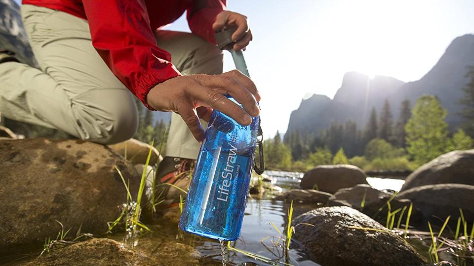 A LifeStraw Go water bottle being refilled. - Credit: LifeStraw/Amazon