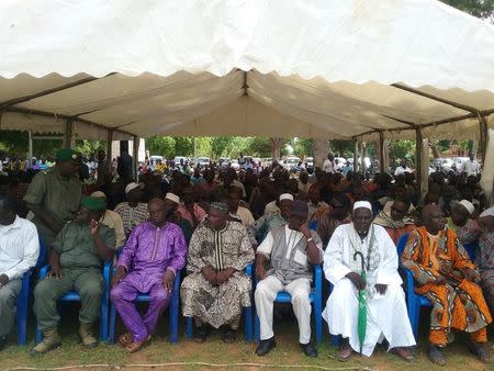 Government officials attend a funeral for 17 soldiers who were killed earlier this week in Segou, Mali, July 21, 2016. Picture taken July 21, 2016. REUTERS/Mamadou Camara