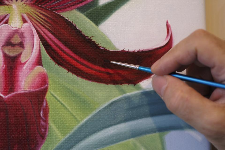 Painting petal details with oil paints