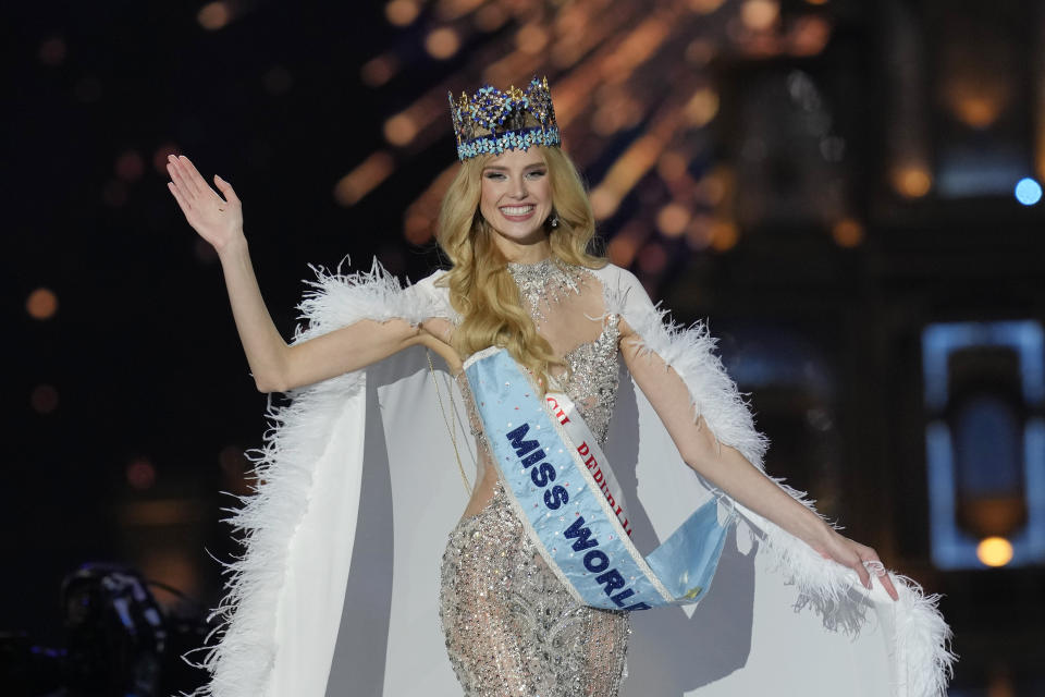 Krystyna Pyszková of Czech Republic waves after she was crowned Miss World in Mumbai, India, Saturday, Mar. 9, 2024. (AP Photo/Rajanish Kakade)