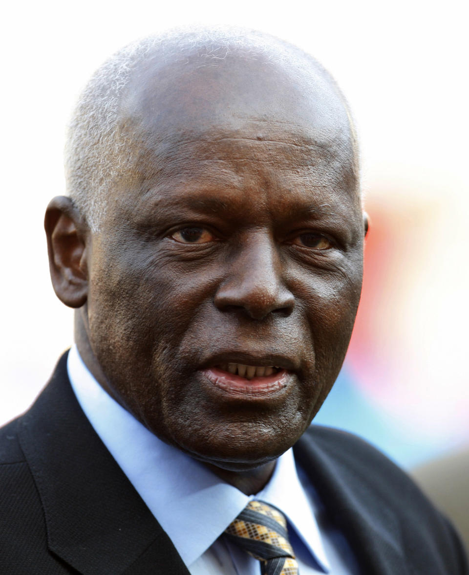 CAPTION CORRECTS AGE - FILE - Angolan President Jose Eduardo dos Santos attends the African Cup of Nations final soccer match between Ghana and Egypt, in Luanda, Angola, Sunday, Jan. 31, 2010. Former Angolan president Jose Eduardo dos Santos has died in a clinic in Barcelona, Spain after an illness, the Angolan government said. He was 79 years old and died following a long illness, the government said Friday, July 8, 2022 in an announcement on its Facebook page. (AP Photo/Darko Bandic, File)