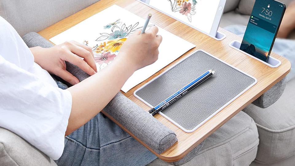 This lap desk provides comfortable padding for overworked wrists and laid-out legs.