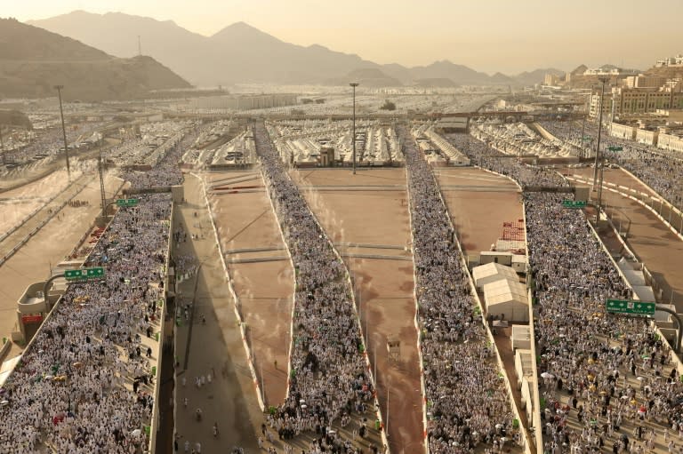 Muslim pilgrims arrive to perform the symbolic 'stoning of the devil' ritual as part of the hajj pilgrimage in Mina, near Saudi Arabia's holy city of Mecca, on June 16, 2024 (Fadel Senna)