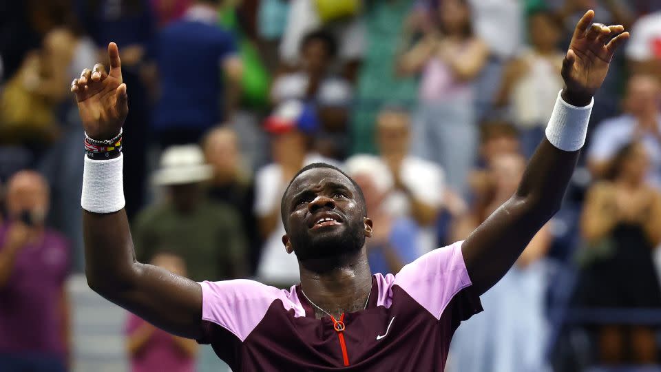 Tiafoe celebrates after defeating Rafael Nadal in the fourth round of the US Open in September 2022. - Mike Stobe/Getty Images North America/Getty Images