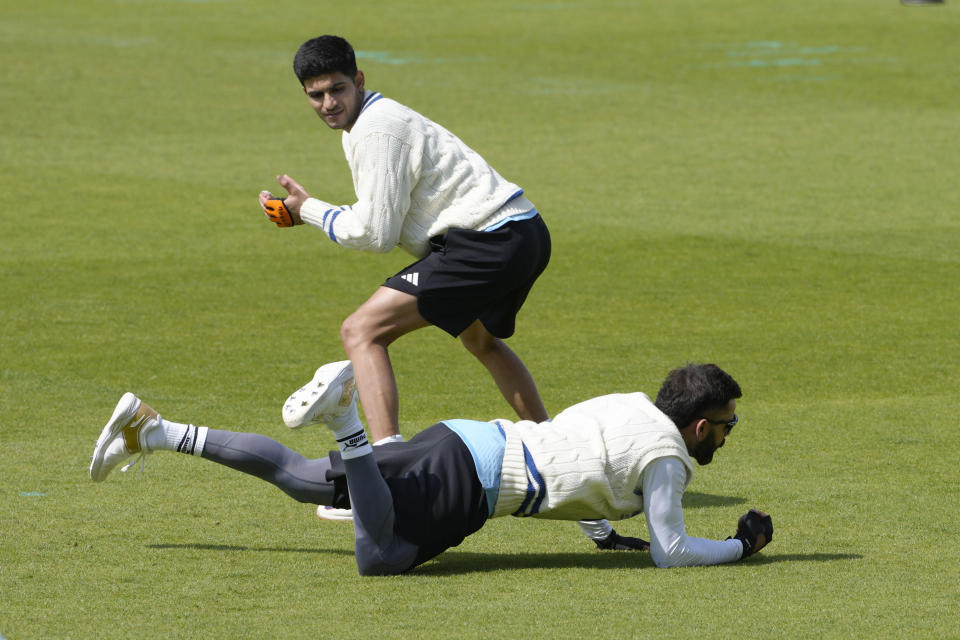 India's Virat Kohli catches a ball during a training session at The Oval cricket ground in London, Monday, June 5, 2023. Australia will play India in the World Test Championship 2023 Final at The Oval starting June 7. (AP Photo/Kirsty Wigglesworth)