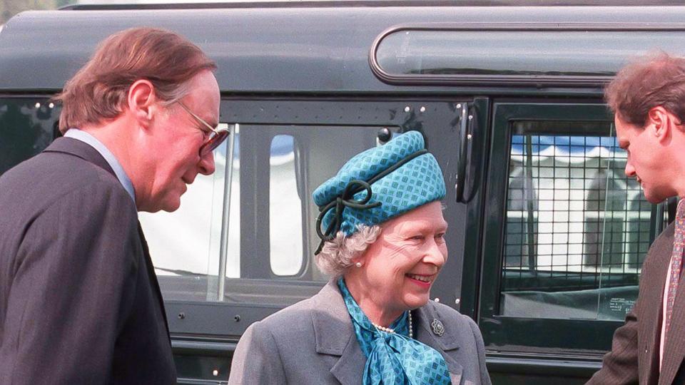 Queen elizabeth at horse show in grey skirt suit