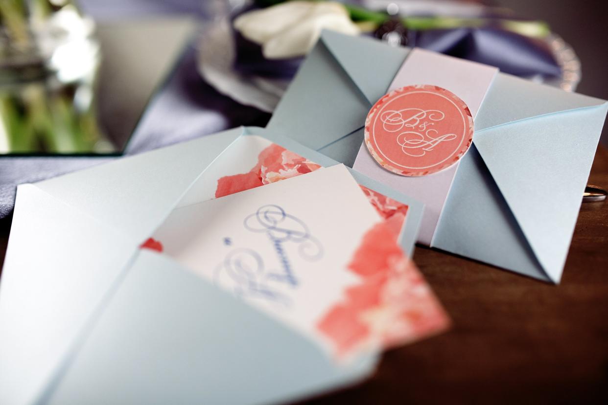 wedding invitations on table