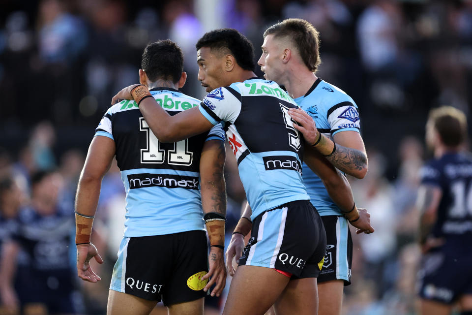 Cronulla Sharks players during their win over the Cowboys.