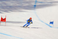 Italy's Federica Brignone speeds down the course during the super G portion of the women's combined race, at the alpine ski World Championships, in Cortina d'Ampezzo, Italy, Monday, Feb. 15, 2021. (AP Photo/Giovanni Auletta)