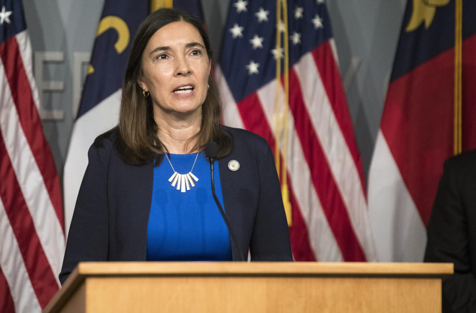 FILE - N.C. Supreme Court Associate Justice Anita Earls speaks during a press conference about the creation and goals of The North Carolina Task Force for Racial Equity in Criminal Justice on June 9, 2020, in Raleigh, N.C. A 2018 law requiring photo identification to vote in North Carolina remains invalidated after a narrow majority on the state Supreme Court agreed Friday, Dec. 16, 2022, with a lower court decision that struck it down. (Julia Wall/The News & Observer via AP, File)