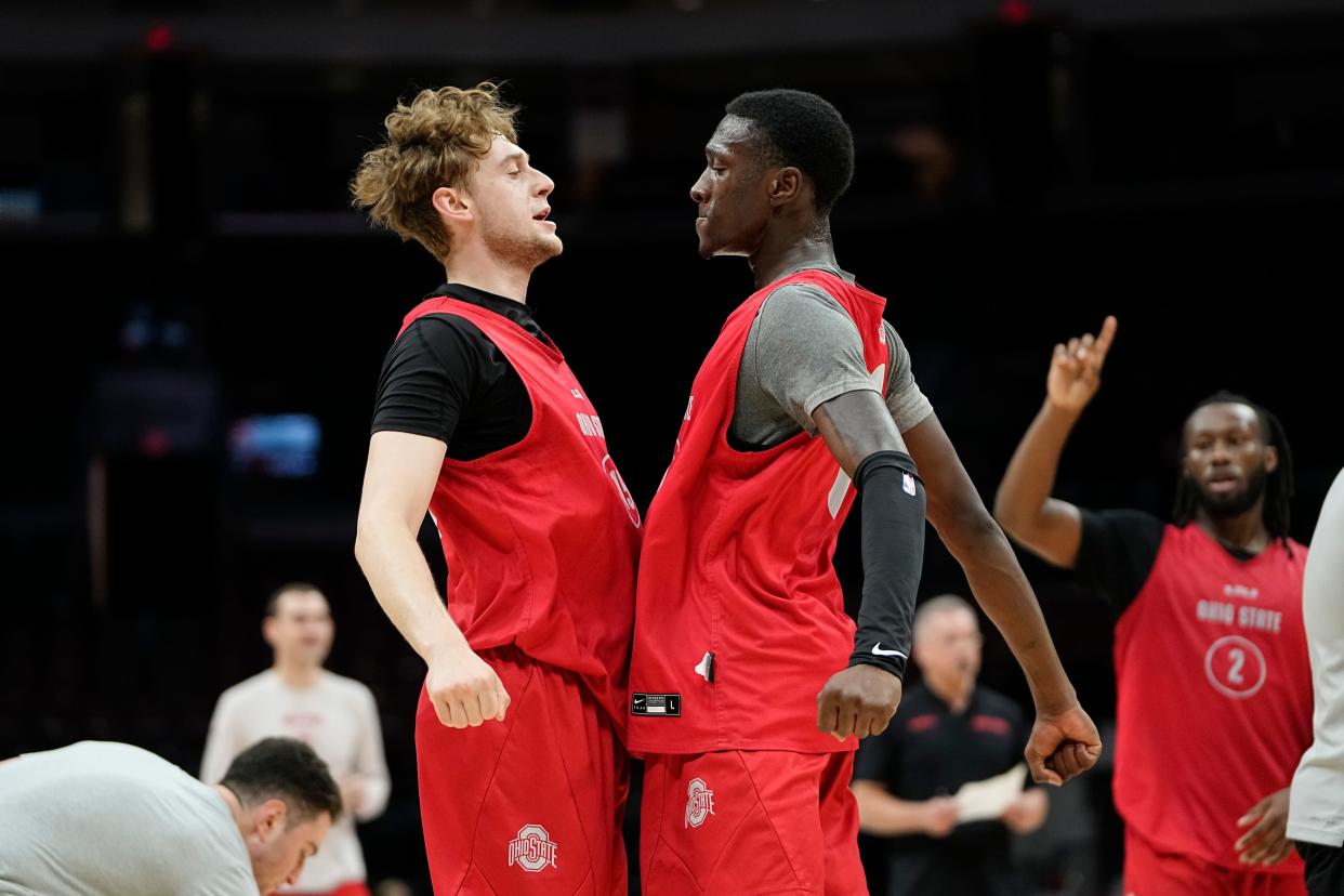 Oct 19, 2023; Columbus, Ohio, USA; Ohio State Buckeyes guard Bowen Hardman (15) gets a chest bump from guard Scotty Middleton (0) after making a shot during an open practice at Value City Arena.