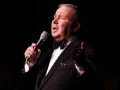 <p>Frank Sinatra Jr., who followed in his father’s footsteps and became a known singer-songwriter in his own right, died of cardiac arrest while on tour on March 16. He was 72. — (Pictured) Frank Sinatra Jr. performs at KLAC’s Mistletoe and Martinis Concert in 2003. ( Bryan Linden/WireImage via Getty Images) </p>