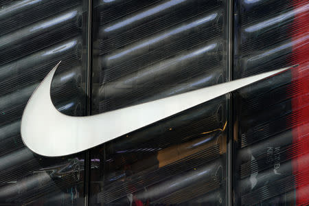 FILE PHOTO: The Nike swoosh logo is seen outside the store on 5th Ave in New York, New York, U.S., March 19, 2019. REUTERS/Carlo Allegri