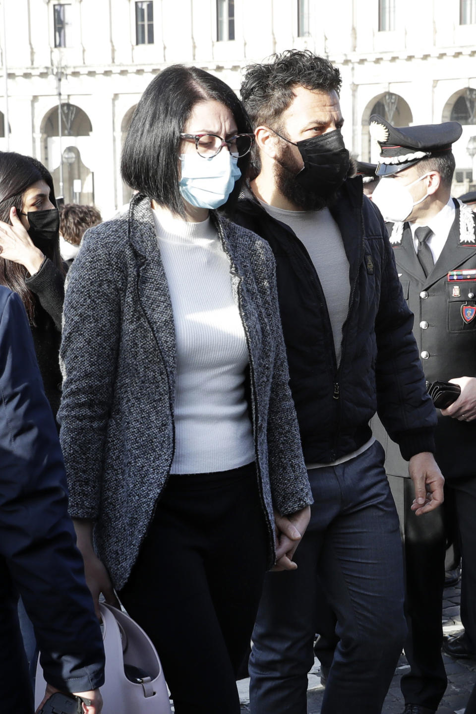 Domenica Benedetto, partner of Italian Carabinieri police officer Vittorio Iacovacci, arrives for the state funeral of Iacovacci and the Italian ambassador to the Democratic Republic of Congo Luca Attanasio, in Rome's Santa Maria degli Angeli Church, Thursday, Feb. 25, 2021. Italy is pressing the United Nations for answers about the attack Monday on a U.N. food aid convoy in Congo that left the young ambassador and his paramilitary police bodyguard dead. (AP Photo/Andrew Medichini)