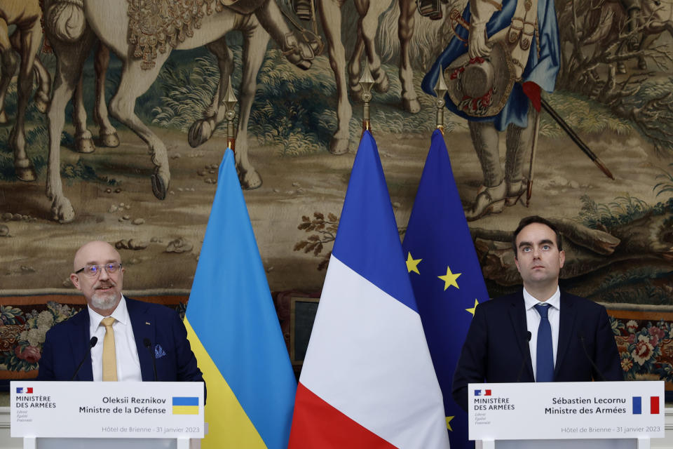 French Defense Minister Sebastien Lecornu, right, and Ukrainian Minister of Defense Oleksii Reznikov attend a joint press conference Tuesday, Jan. 31, 2023 in Paris. Ukraine's defense minister pays his first official visit to France, meeting with Macron and the defense minister, as Ukraine sets its sights on Western warplanes and other heavy weaponry to push back Russian forces. (AP Photo/Lewis Joly)