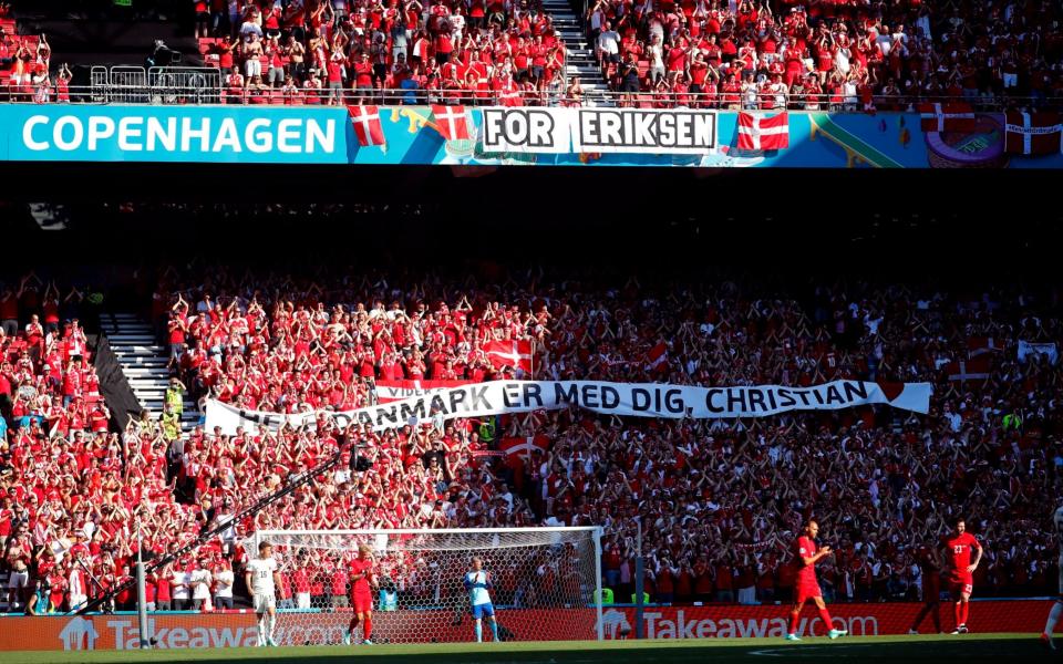 Fans applaud Christian Eriksen. - REUTERS