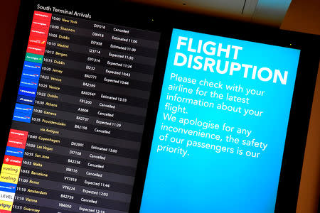 An arrivals board in the South Terminal building at Gatwick Airport, after the airport reopened to flights following its forced closure because of drone activity, in Gatwick, Britain, December 21, 2018. REUTERS/Toby Melville