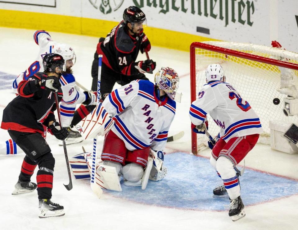 Carolina Hurricanes center Seth Jarvis (24) scores on New York Rangers goaltender Igor Shesterkin (31) to take a 2-0 lead in the second period during Game 6 in the second round of the 2024 Stanley Cup playoffs on Thursday, May 16, 2024 at PNC Arena in Raleigh N.C.