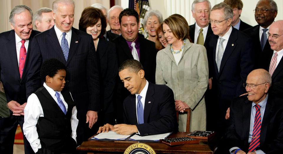 President Barack Obama signs the Affordable Care Act on March 23, 2010.