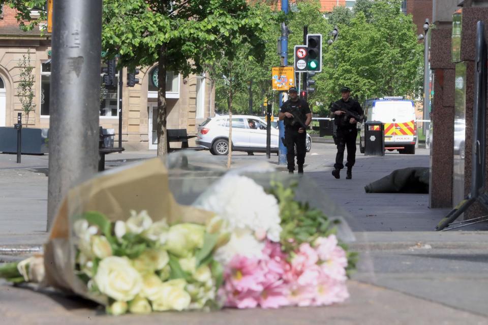 Tributes: Flowers left close to Manchester Arena, where a suicide bomber killed 22 people: PA