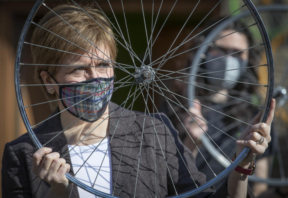 <p>First Minister Nicola Sturgeon, leader of the Scottish National Party (SNP), at the Bike for Good Glasgow South Community Hub during campaigning for the Scottish Parliamentary election. Picture date: Thursday April 22, 2021.</p>
