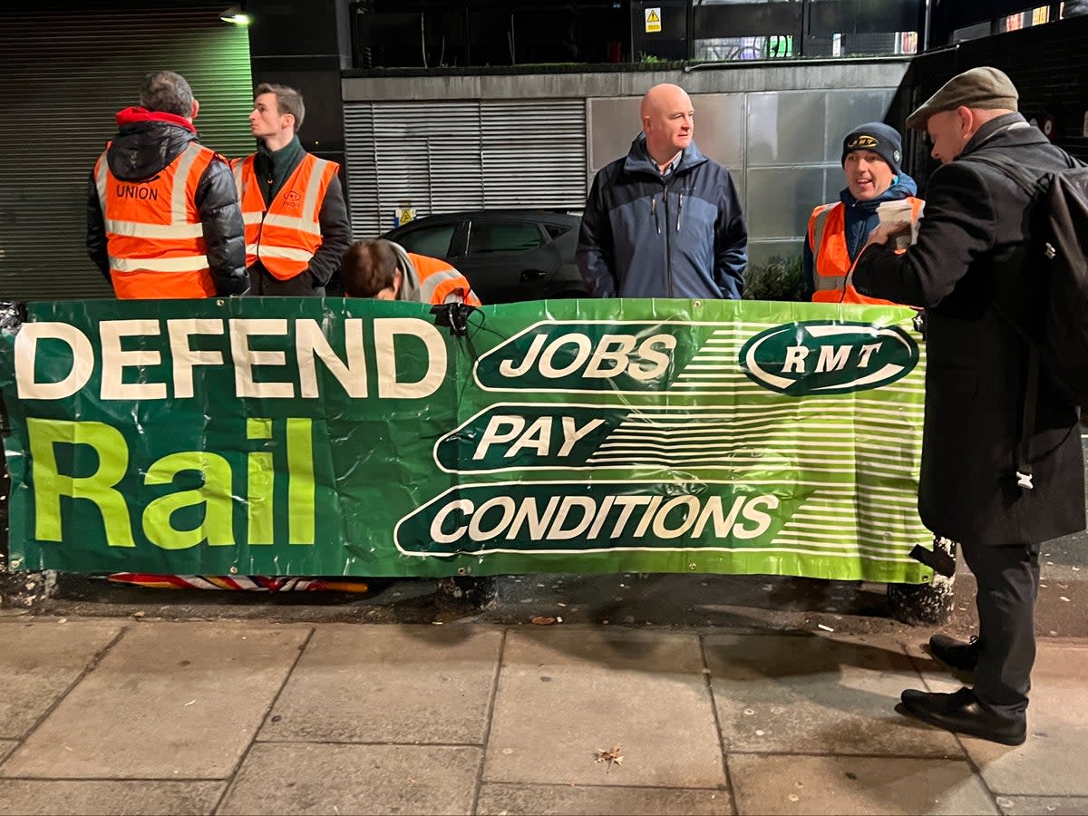 Looking ahead: Mick Lynch (centre), general secretary of the RMT union, on the picket line at Euston at the start of the January 2023 strikes (Simon Calder)