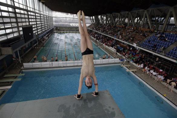 Crystal Palace diving club member Ford Fagan dives during a training session in London March 9, 2012.