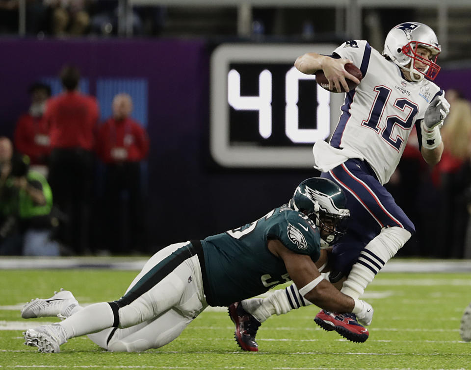 <p>Philadelphia Eagles defensive end Brandon Graham (55) tackles New England Patriots quarterback Tom Brady (12), during the first half of the NFL Super Bowl 52 football game, Sunday, Feb. 4, 2018, in Minneapolis. (AP Photo/Frank Franklin II) </p>