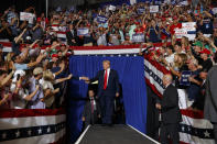 President Donald Trump arrives to speak at a campaign rally at Williams Arena in Greenville, N.C., Wednesday, July 17, 2019. (AP Photo/Carolyn Kaster)