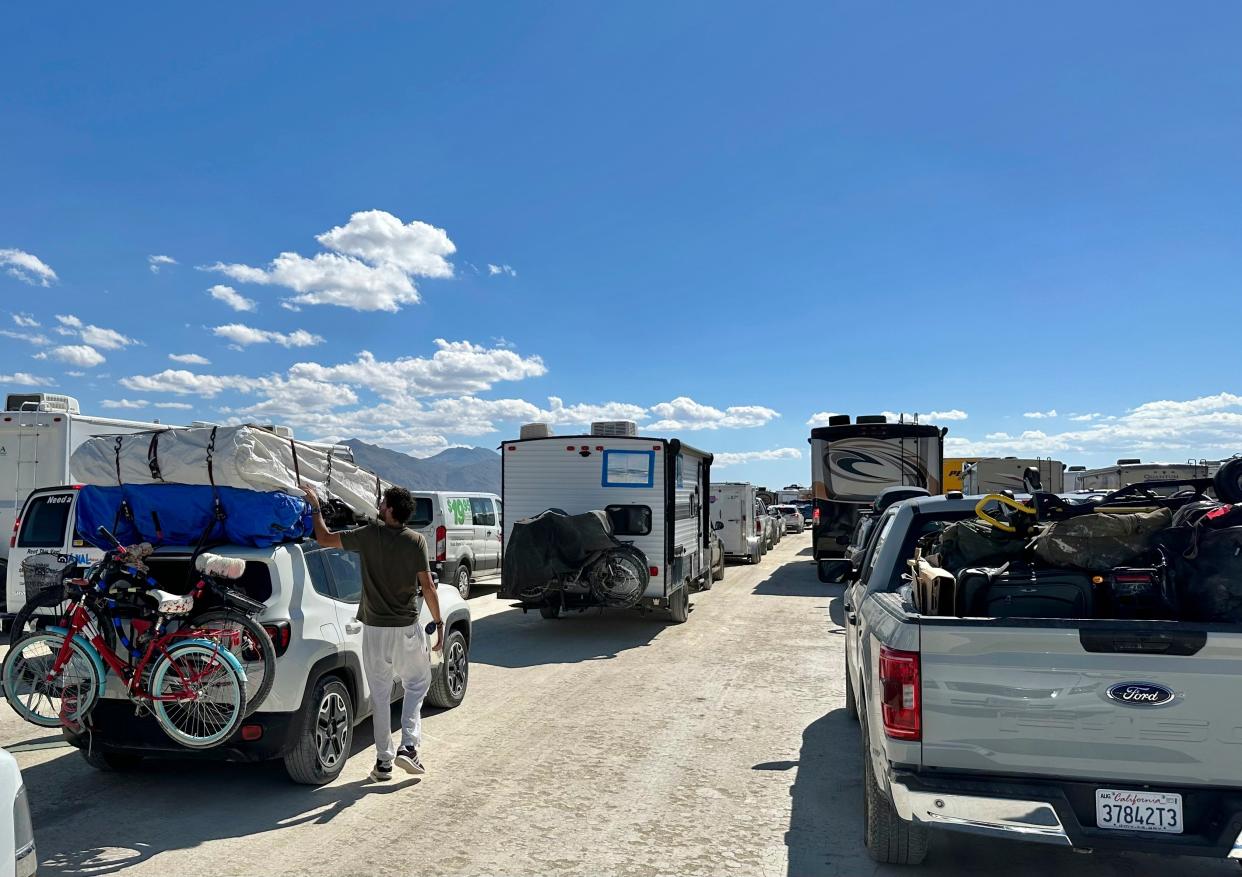 People leave the Burning Man festival on Tuesday Sept. 5, 2023 in Reno, Nevada (AP)