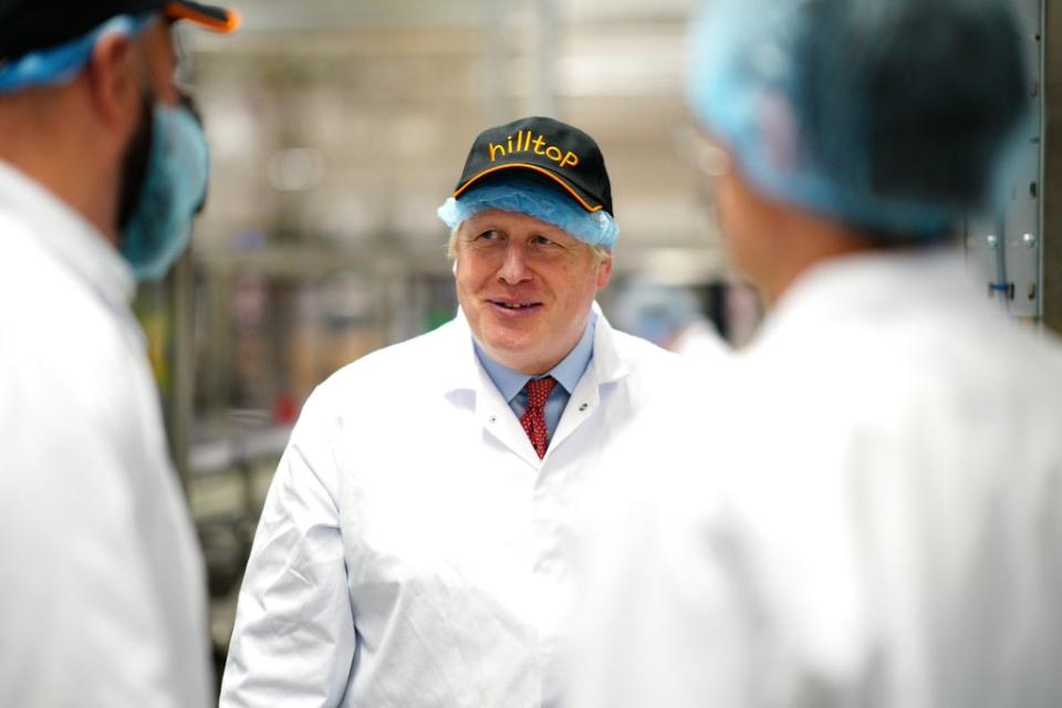Prime Minister Boris Johnson visited Hilltop Honey in Newtown, Powys, Wales, on Friday (Ben Birchall/PA) (PA Wire)