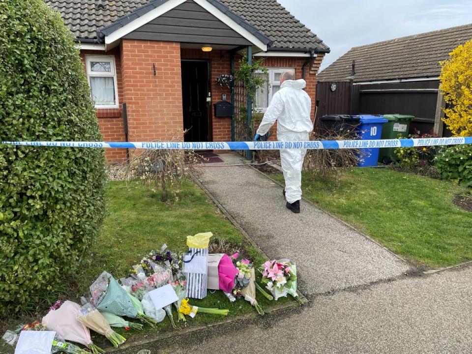 A forensics officer at the property where 82-year-old Joy Middleditch died after masked robbers burst into her home and knocked her to the ground (PA)