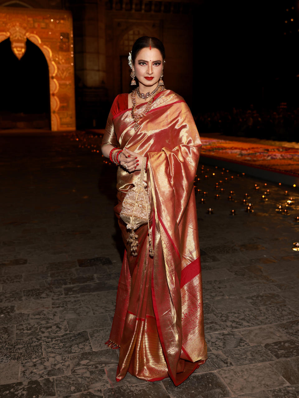 MUMBAI, INDIA - MARCH 30: Rekha attends the Christian Dior Womenswear Fall 2023 show at the Gateway of India monument on March 30, 2023 in Mumbai, India. (Photo by Arnold Jerocki/Getty Images for Christian Dior)
