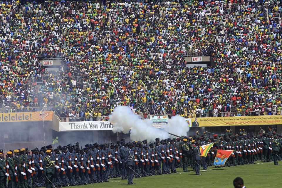 Members of the Defence Forces take part in Zimbabwean President Emmerson Mnangagwa's inauguration ceremony at the National Sports Stadium in Harare, Sunday, Aug. 26, 2018. Zimbabwe on Sunday inaugurated a president for the second time in nine months as a country recently jubilant over the fall of longtime leader Robert Mugabe is now largely subdued by renewed harassment of the opposition and a bitterly disputed election. (AP Photo/Tsvangirayi Mukwazhi)