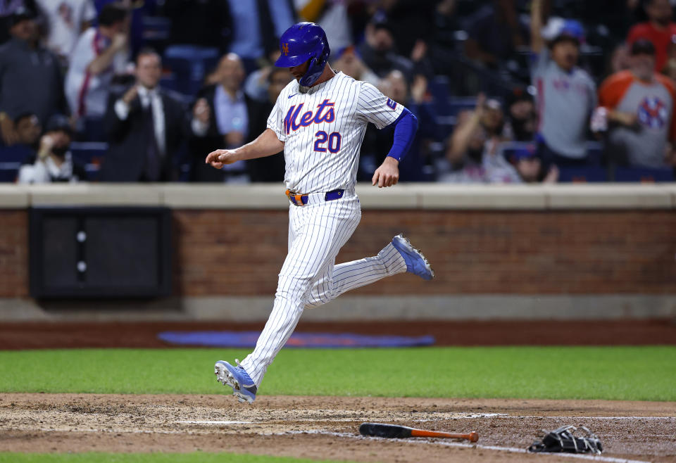 New York Mets' Pete Alonso scores against the Arizona Diamondbacks during the seventh inning of a baseball game Thursday, May 30, 2024, in New York. (AP Photo/Noah K. Murray)