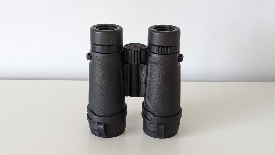 Nikon Monarch M5 12x42 binoculars on a white table