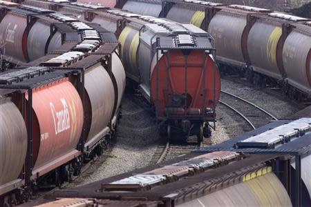 Train cars sit idle at a grain terminal in the port of Vancouver after government grain weighers set up picket lines closing four of five Vancouver grain terminals in a push for a new contract for federal trade employees. The bulk of Canada's winter wheat exports move through the port of Vancouver.