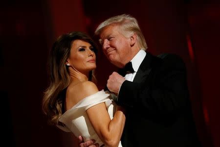 U.S. President Donald Trump and first lady Melania Trump attend the Liberty Ball in honor of his inauguration in Washington, U.S. January 20, 2017. REUTERS/Jonathan Ernst TPX IMAGES OF THE DAY