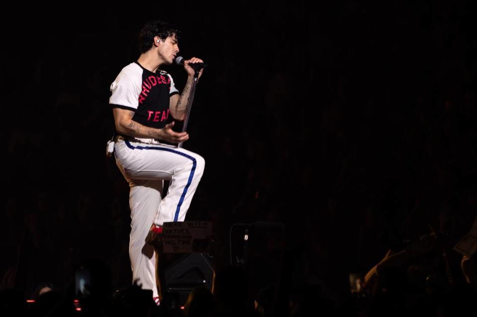 Joe Jonas from The Jonas Brothers sings on a platform at the Spectrum Center in Charlotte, North Carolina on September 30, 2023.