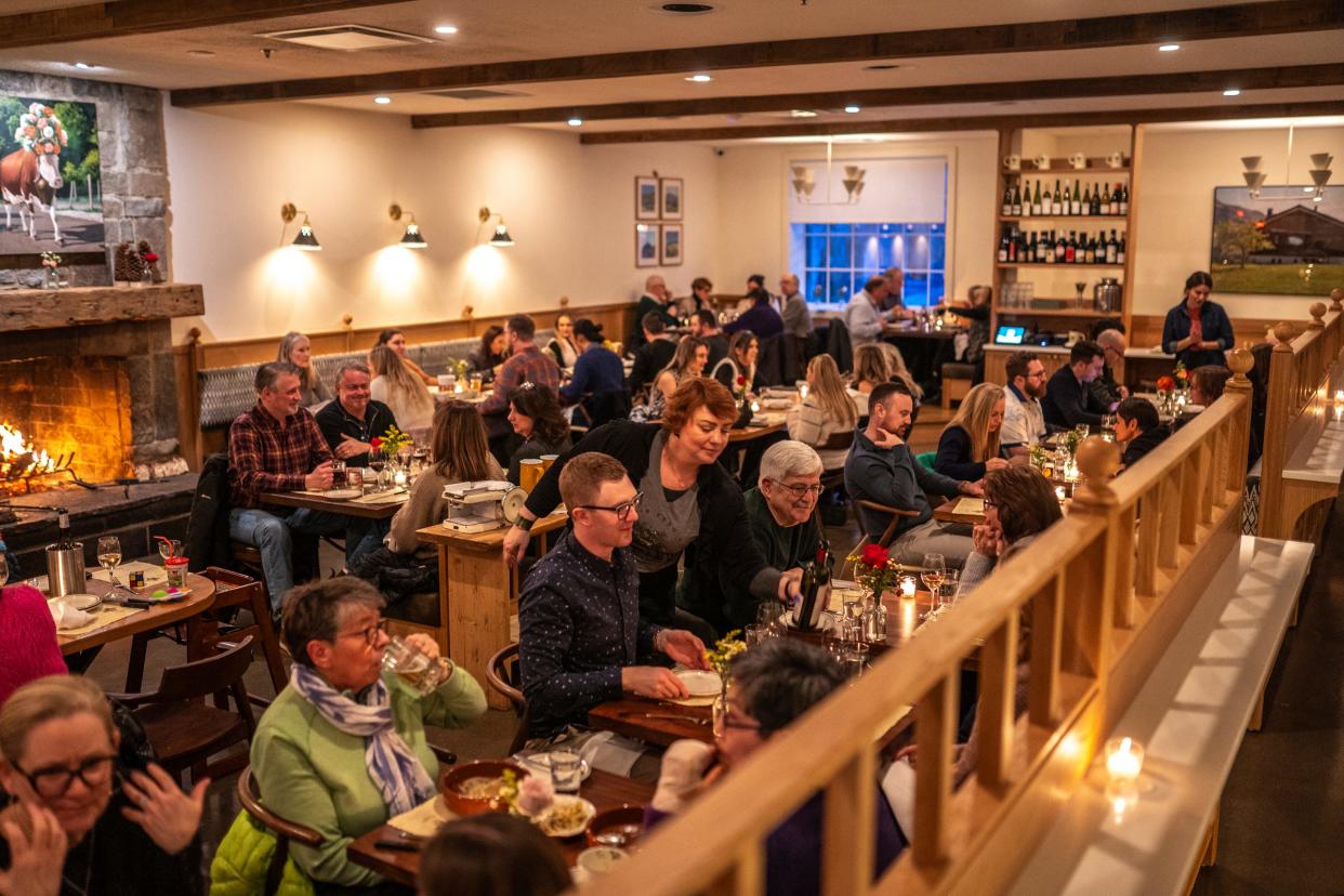 People dine at Alpino in Detroit's Corktown neighborhood on Friday, February 16, 2024. The restaurant focuses on a cuisine inspired by the Alps and does so in a warm, elegant environment paired with excellent hospitality.