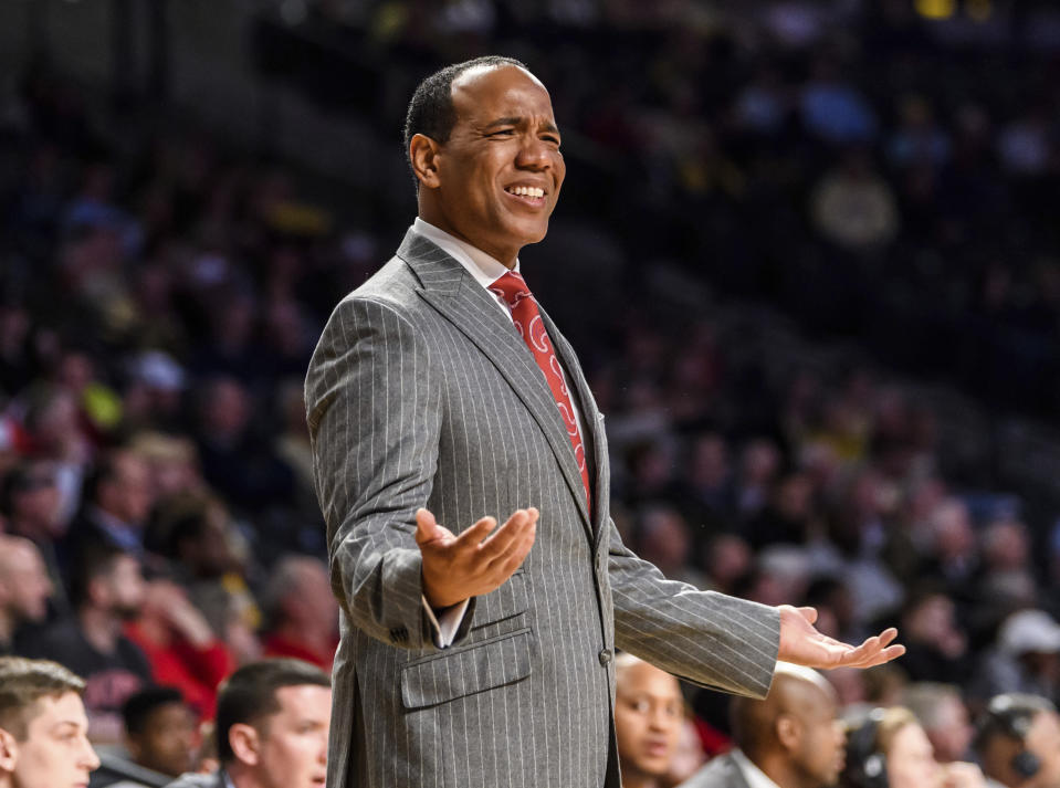 North Carolina State head coach Kevin Keatts tore his patellar tendon in a pickup game on Wednesday. (AP Photo/Danny Karnik)