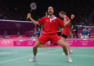 LONDON, ENGLAND - AUGUST 01: Joachim Fischer and Christinna Pedersen of Denmark celebrate beating Sudket Prapakamol and Saralee Thoungthongkam in their Mixed Doubles Badminton on Day 5 of the London 2012 Olympic Games at Wembley Arena at Wembley Arena on August 1, 2012 in London, England. (Photo by Michael Regan/Getty Images)